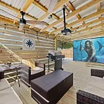 Sea Escape: Pcb Two Blocks From Beach